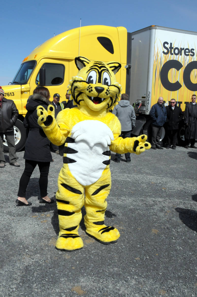 Mascot Friendly the Tiger gives a wave Monday, April 4, 2016 during the groundbreaking for the company's future distribution center in Johnstown, Ont. The facility should be open in 2018. (Newswatch Group/Bill Kingston)